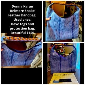 Bellmore Snake, handbag with gold trim on handle.